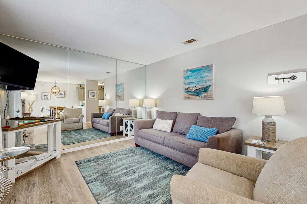 Second Floor Condo with Shared Pool, Fast WiFi, Central AC, and Full Kitchen
