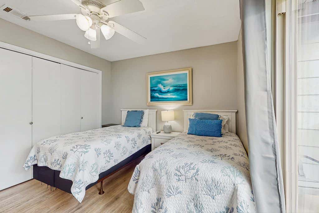 Second Floor Condo with Shared Pool, Fast WiFi, Central AC, and Full Kitchen
