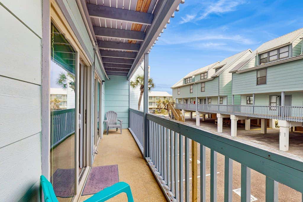 Second Floor Condo with Shared Pool, Fast WiFi, Central AC, and Full Kitchen