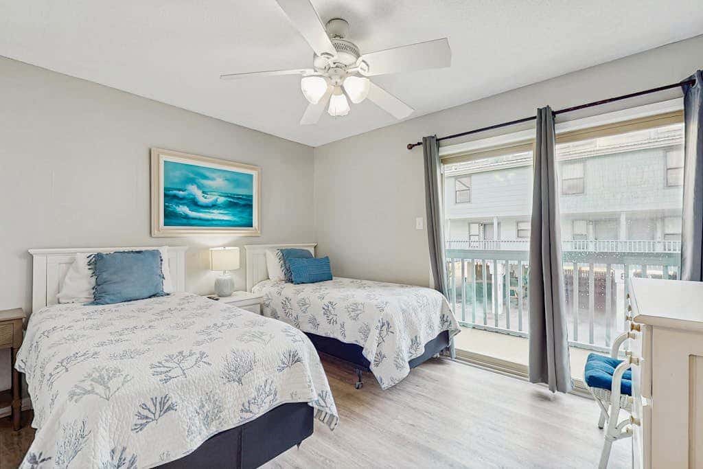 Second Floor Condo with Shared Pool, Fast WiFi, Central AC, and Full Kitchen