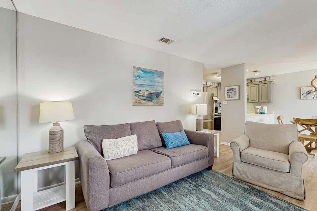 Second Floor Condo with Shared Pool, Fast WiFi, Central AC, and Full Kitchen