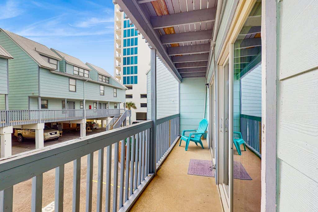 Second Floor Condo with Shared Pool, Fast WiFi, Central AC, and Full Kitchen