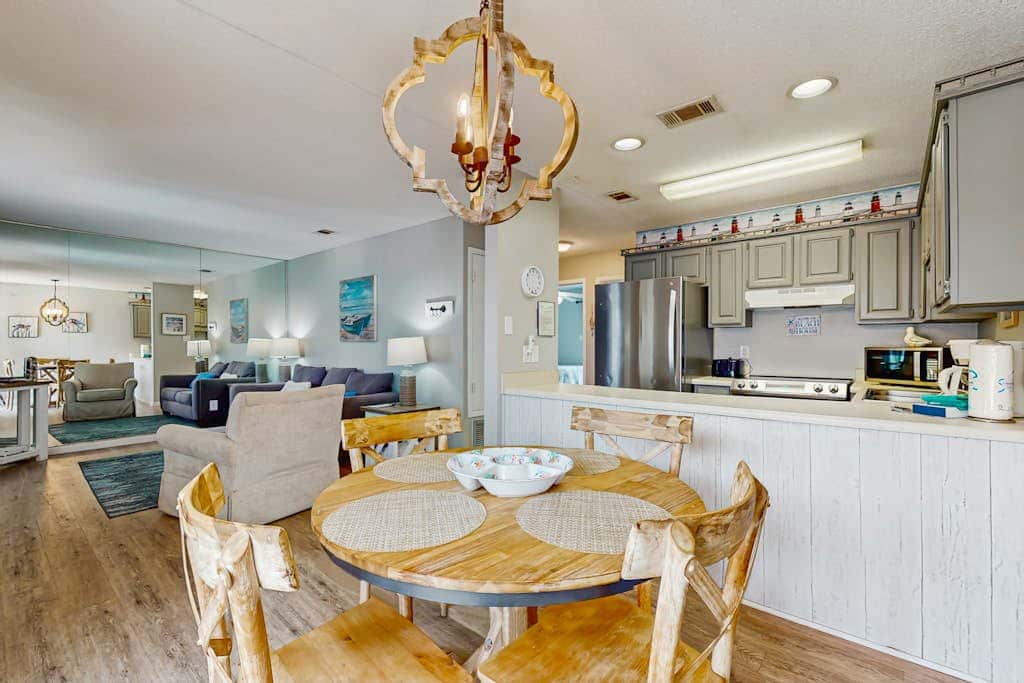 Second Floor Condo with Shared Pool, Fast WiFi, Central AC, and Full Kitchen