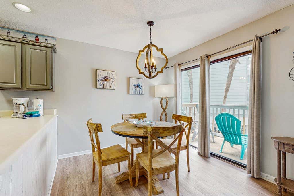 Second Floor Condo with Shared Pool, Fast WiFi, Central AC, and Full Kitchen