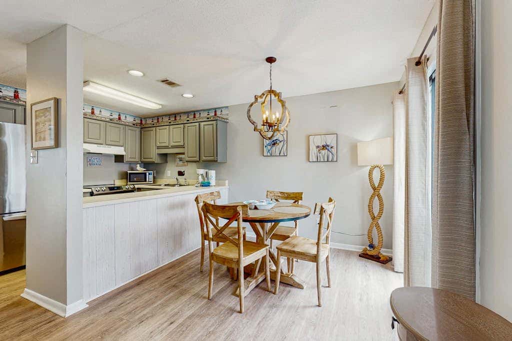 Second Floor Condo with Shared Pool, Fast WiFi, Central AC, and Full Kitchen