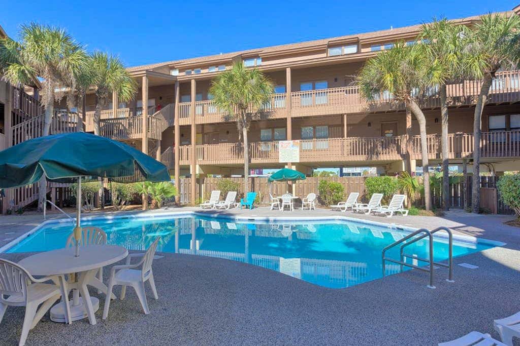 Second Floor Condo with Shared Pool, Fast WiFi, Central AC, and Full Kitchen