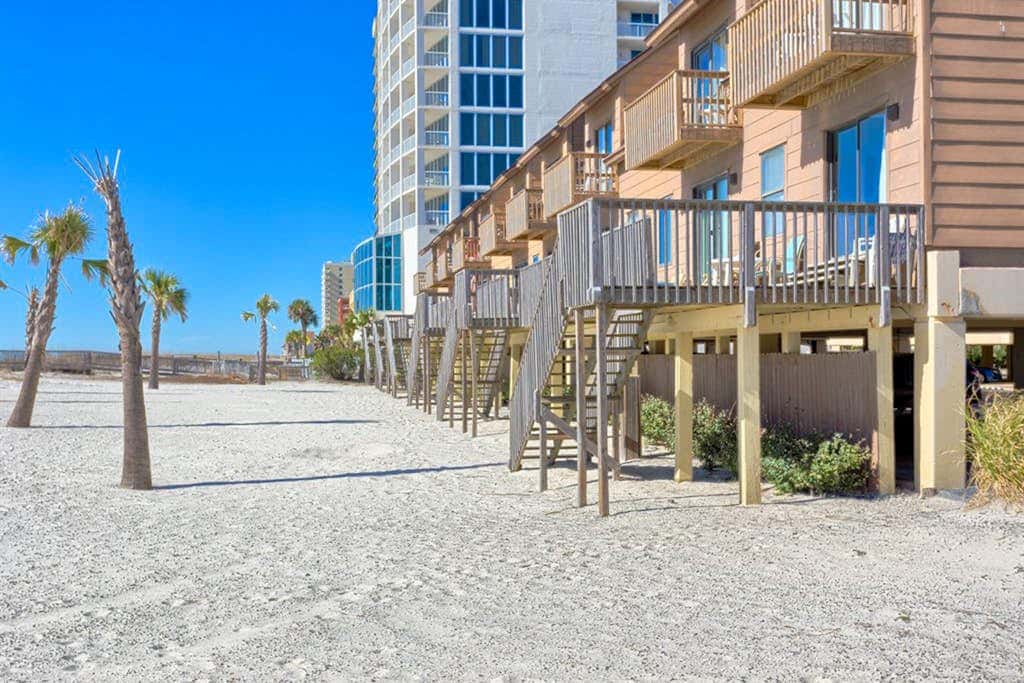Second Floor Condo with Shared Pool, Fast WiFi, Central AC, and Full Kitchen