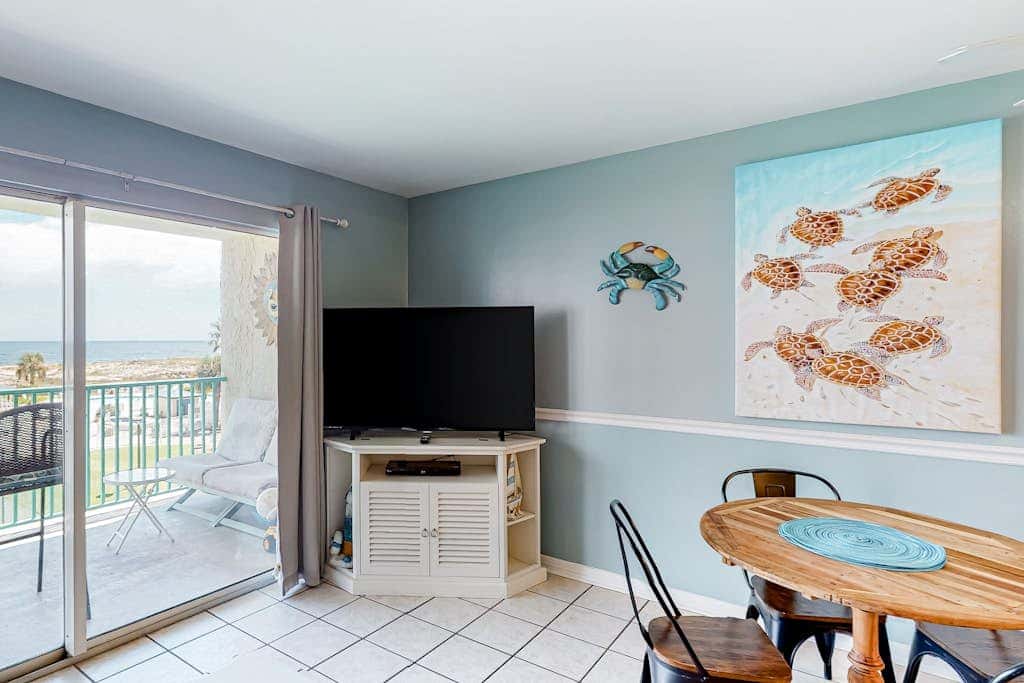 Gulf-view condo with 4 pools, hot tubs, beach access, central AC, & washer/dryer