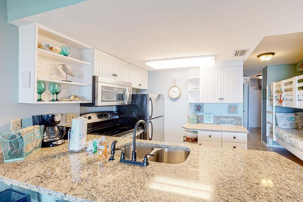 Gulf-view condo with 4 pools, hot tubs, beach access, central AC, & washer/dryer