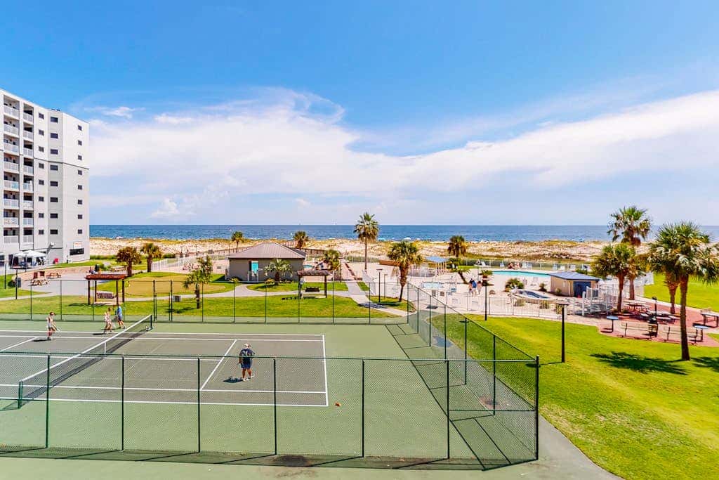 Gulf-view condo with 4 pools, hot tubs, beach access, central AC, & washer/dryer