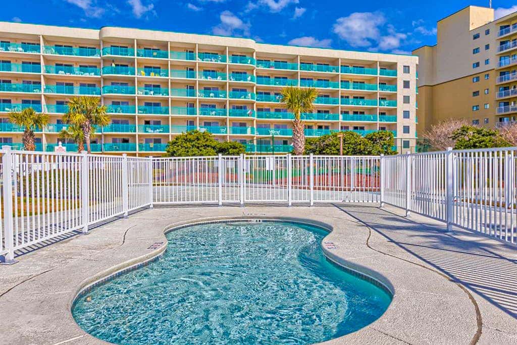 Gulf-view condo with 4 pools, hot tubs, beach access, central AC, & washer/dryer