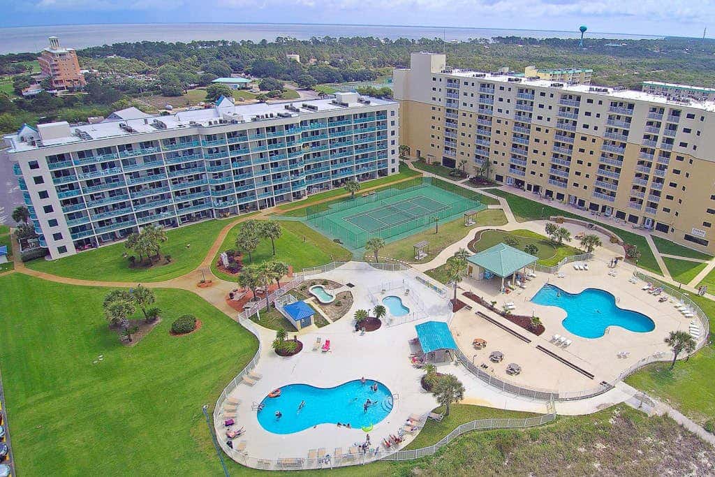 Gulf-view condo with 4 pools, hot tubs, beach access, central AC, & washer/dryer