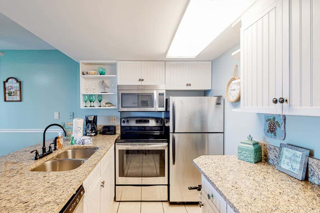 Gulf-view condo with 4 pools, hot tubs, beach access, central AC, & washer/dryer