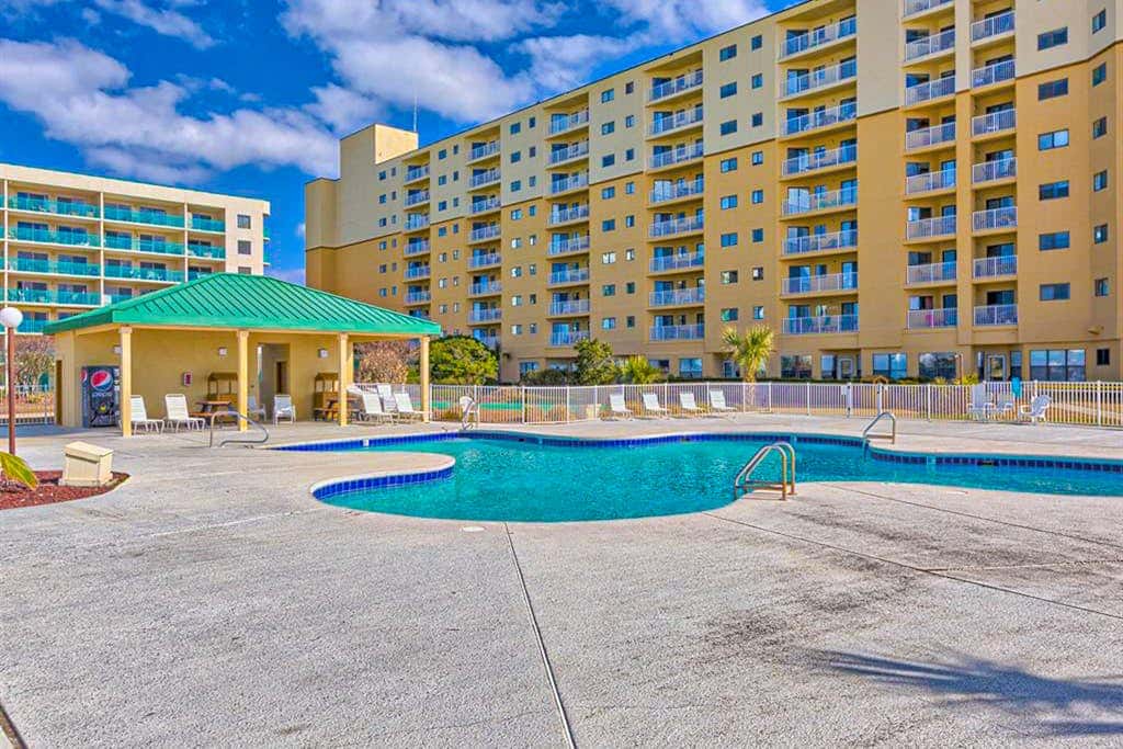 Gulf-view condo with 4 pools, hot tubs, beach access, central AC, & washer/dryer