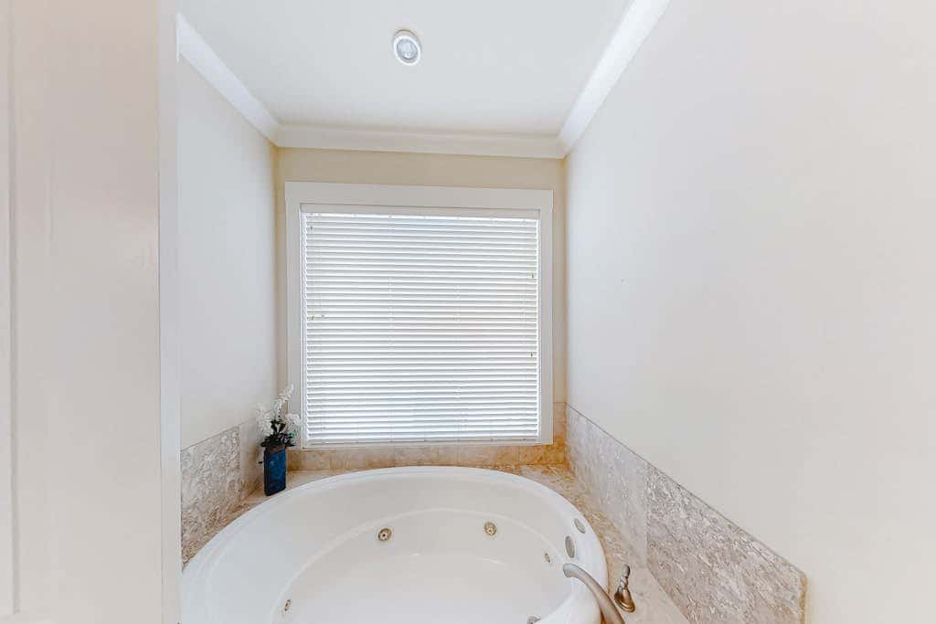 Spacious beachfront wedding-friendly home with multiple decks & shared pool