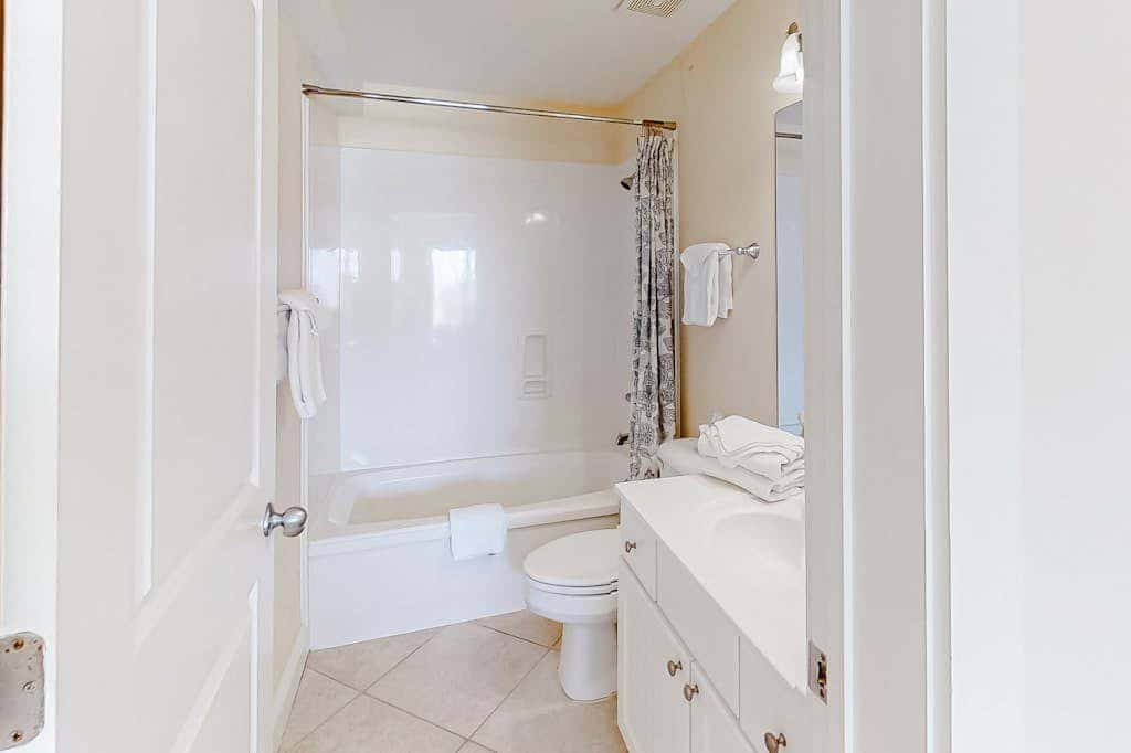 Spacious beachfront wedding-friendly home with multiple decks & shared pool