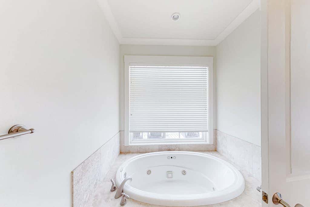 Spacious beachfront wedding-friendly home with multiple decks & shared pool