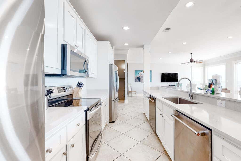 Spacious beachfront wedding-friendly home with multiple decks & shared pool