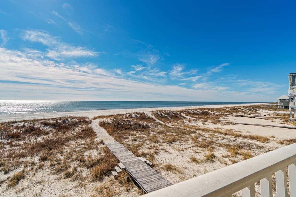 Spacious beachfront wedding-friendly home with multiple decks & shared pool