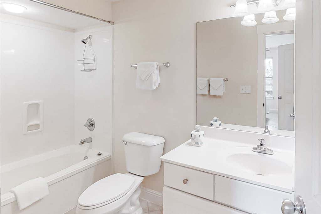 Spacious beachfront wedding-friendly home with multiple decks & shared pool