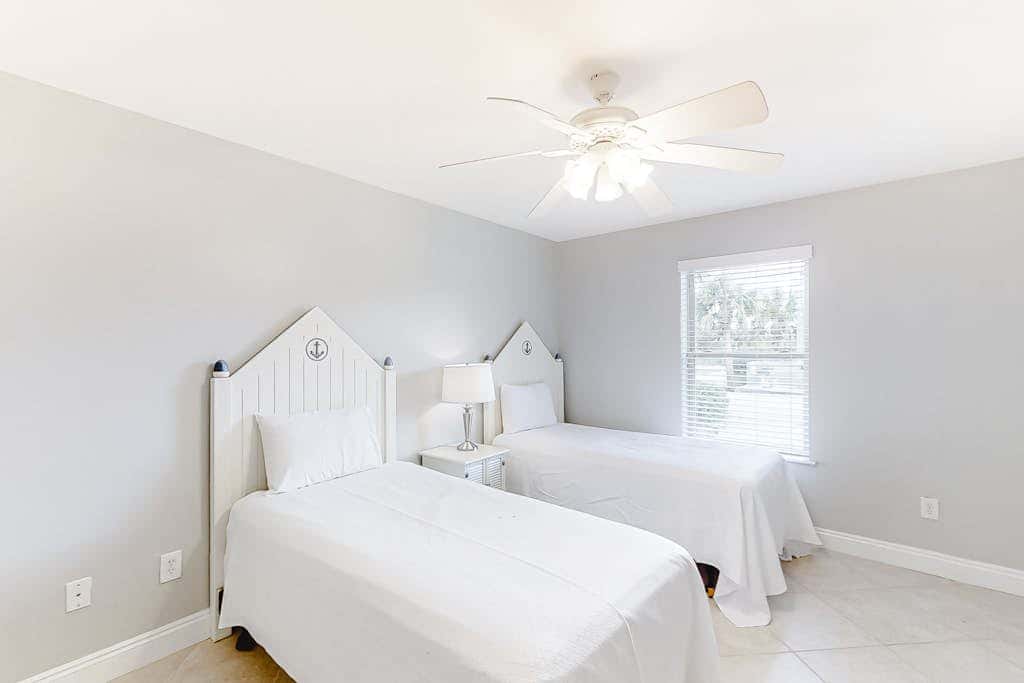Spacious beachfront wedding-friendly home with multiple decks & shared pool