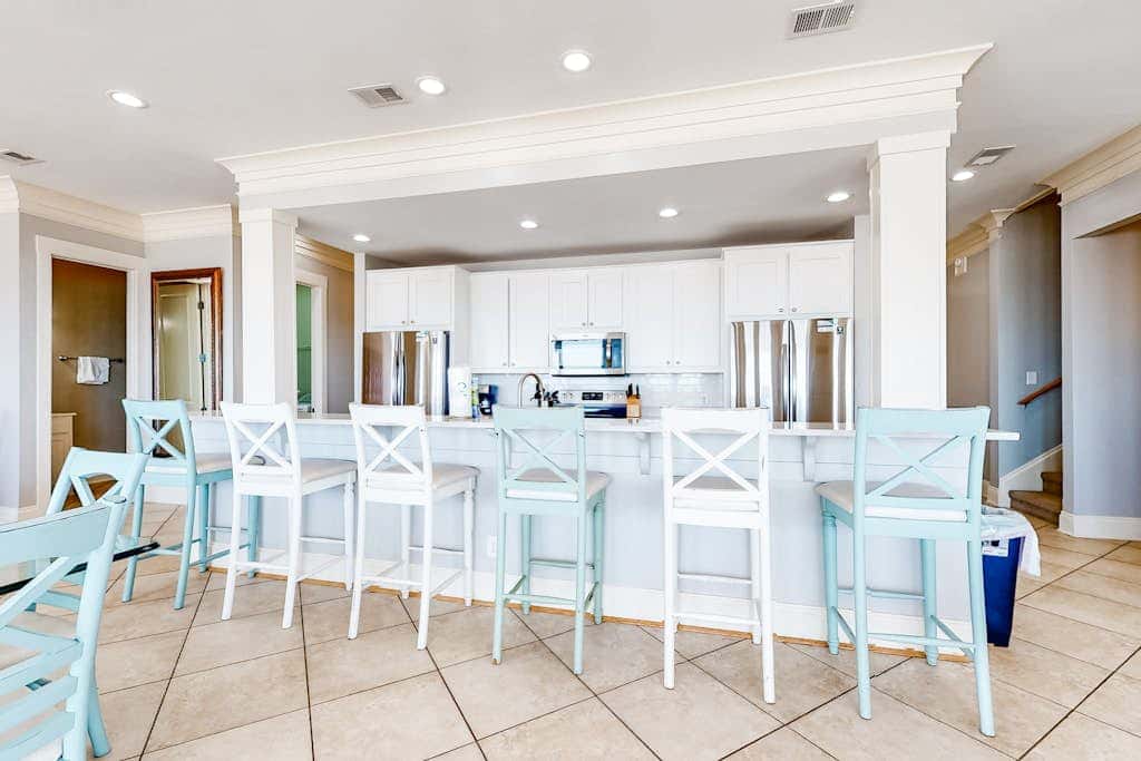 Spacious beachfront wedding-friendly home with multiple decks & shared pool