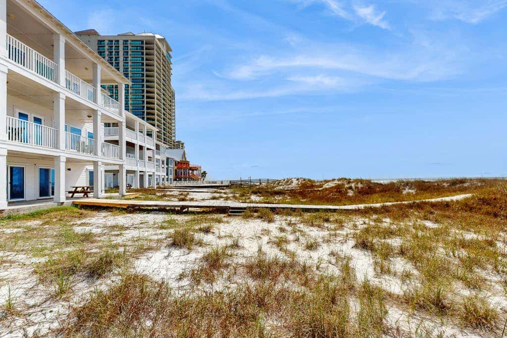 Spacious beachfront wedding-friendly home with multiple decks & shared pool
