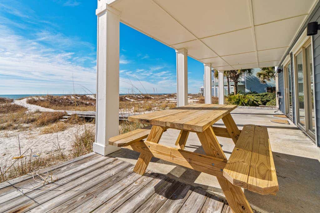 Spacious beachfront wedding-friendly home with multiple decks & shared pool