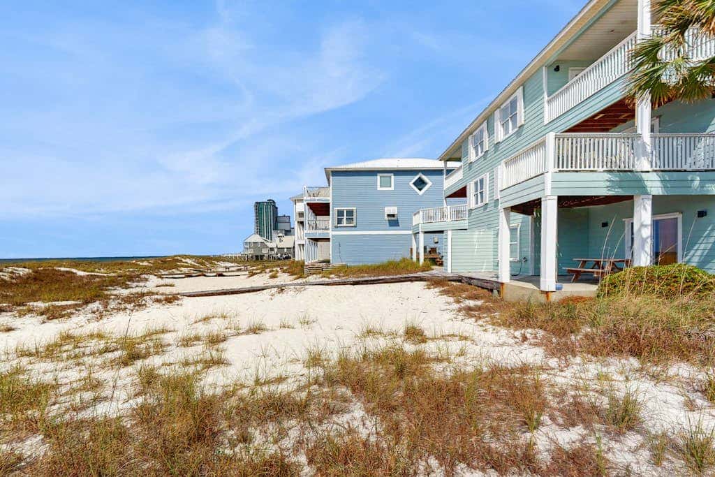 Spacious beachfront wedding-friendly home with multiple decks & shared pool