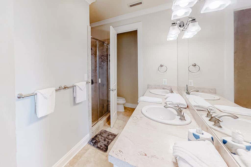 Spacious beachfront wedding-friendly home with multiple decks & shared pool