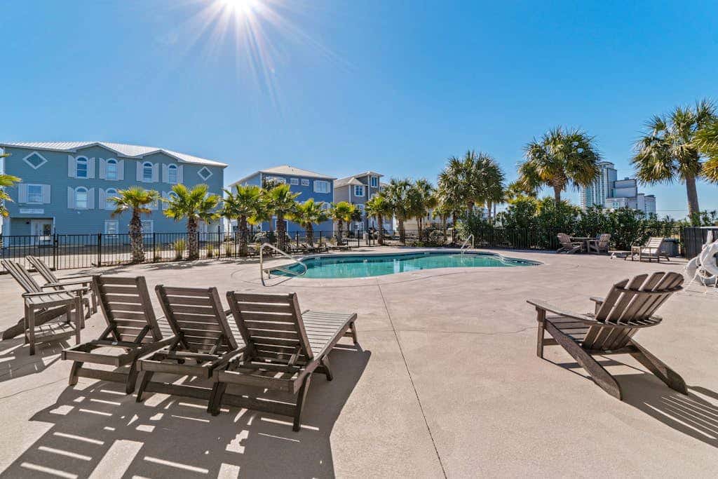 Spacious beachfront wedding-friendly home with multiple decks & shared pool