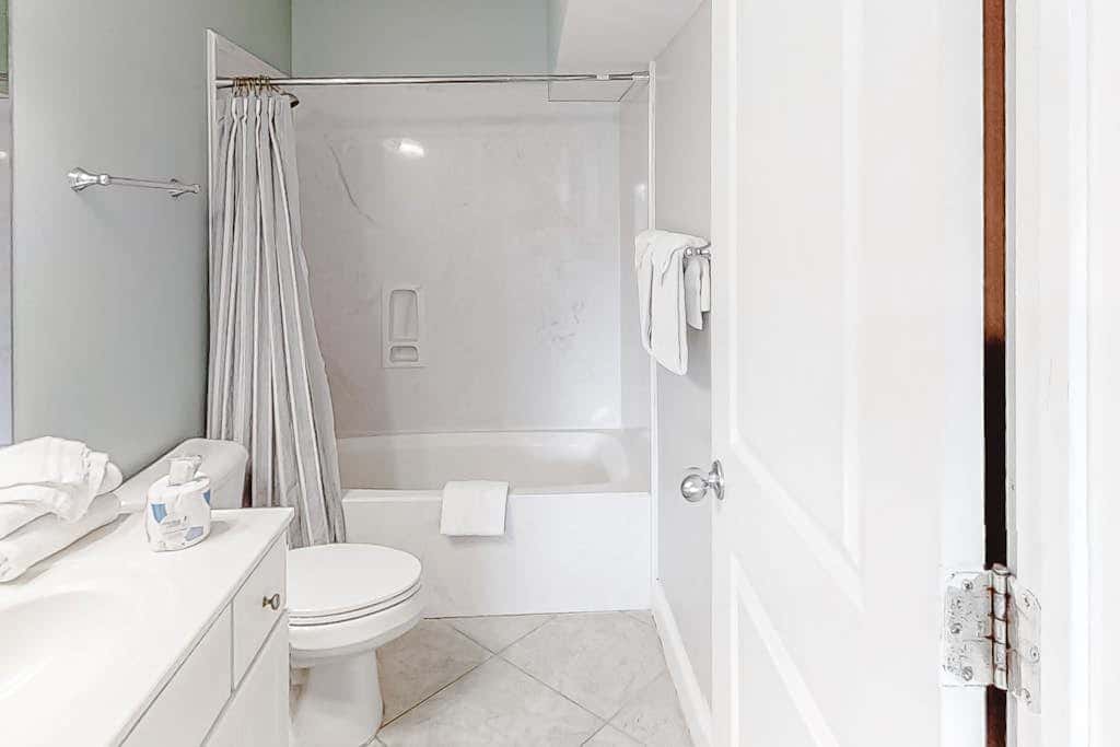 Spacious beachfront wedding-friendly home with multiple decks & shared pool