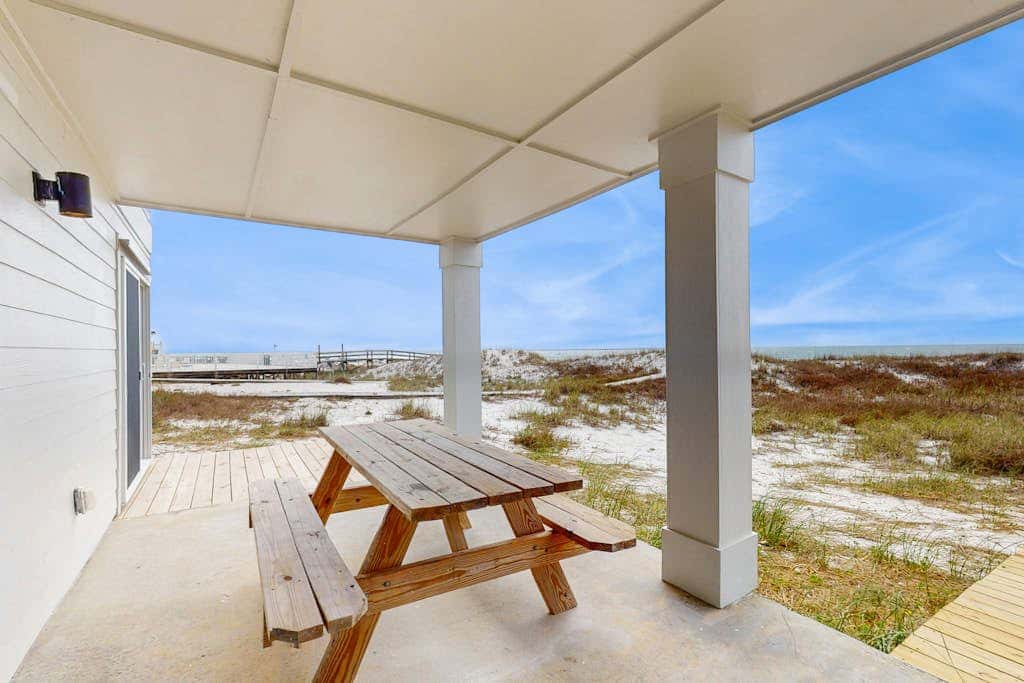 Spacious beachfront wedding-friendly home with multiple decks & shared pool