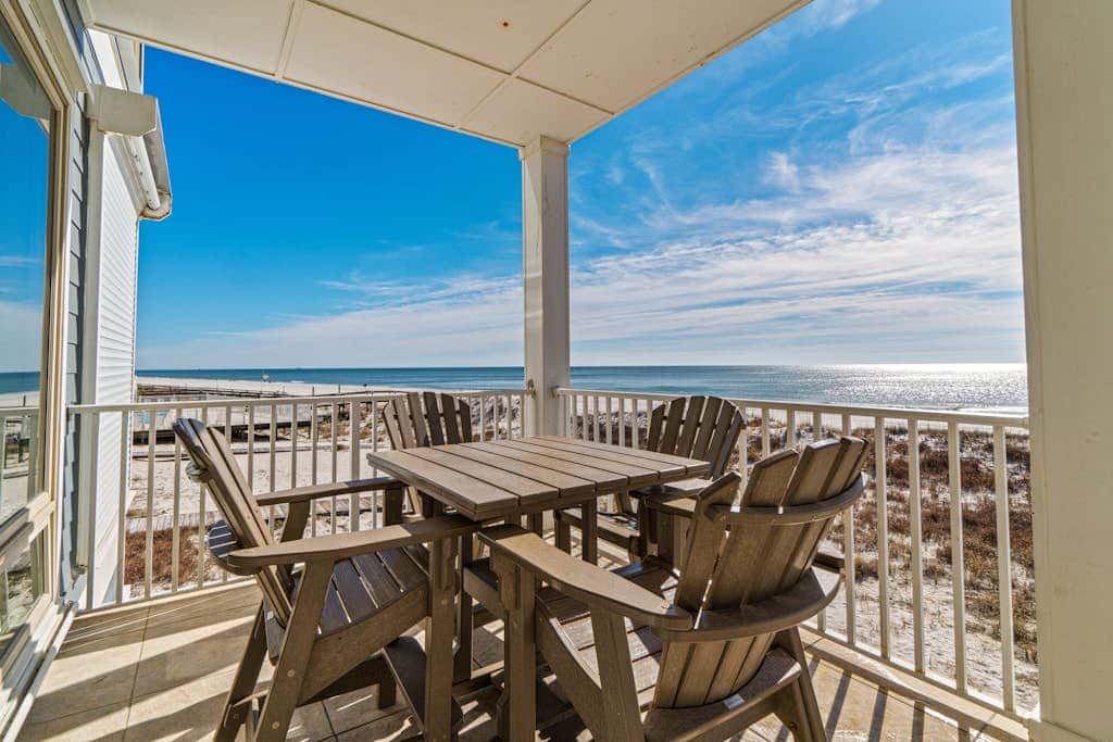 Spacious beachfront wedding-friendly home with multiple decks & shared pool