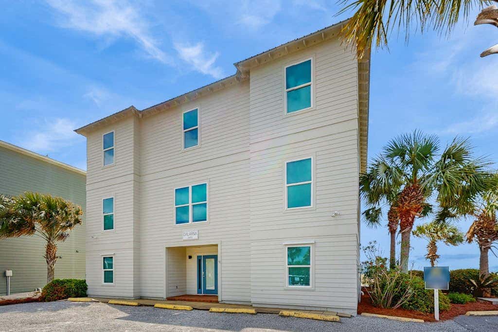 Spacious beachfront wedding-friendly home with multiple decks & shared pool