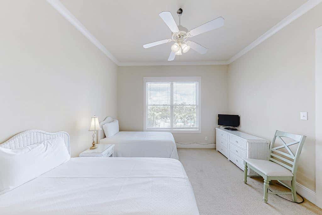 Spacious beachfront wedding-friendly home with multiple decks & shared pool