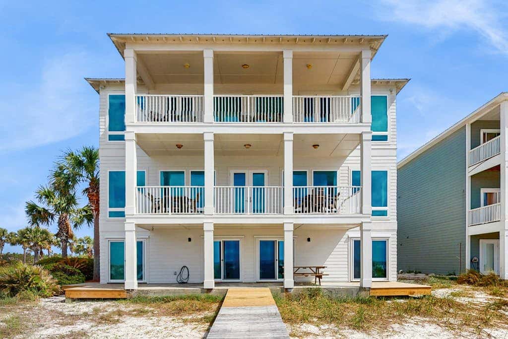 Spacious beachfront wedding-friendly home with multiple decks & shared pool