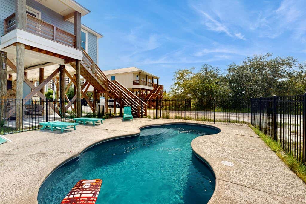 Gorgeous beach house with private pool, outdoor TV & custom grill area