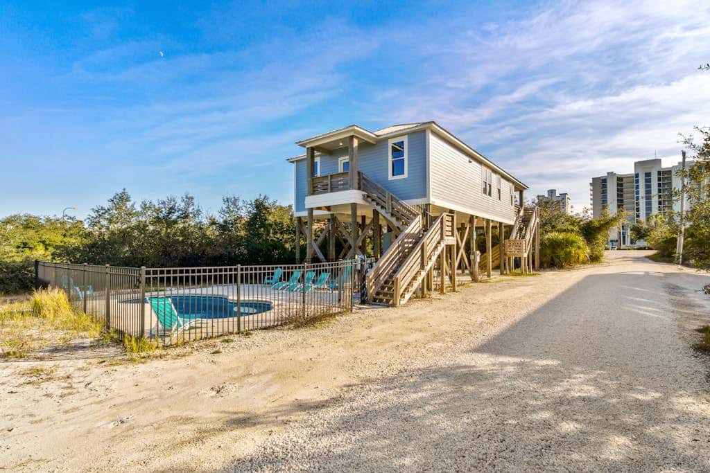 Gorgeous beach house with private pool, outdoor TV & custom grill area