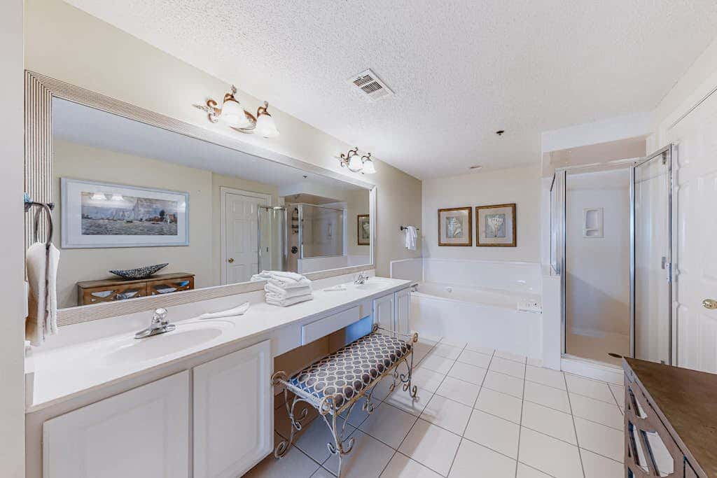 Beachfront resort condo with shared pool, tennis court, free WiFi, central AC