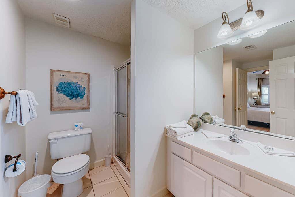 Beachfront resort condo with shared pool, tennis court, free WiFi, central AC