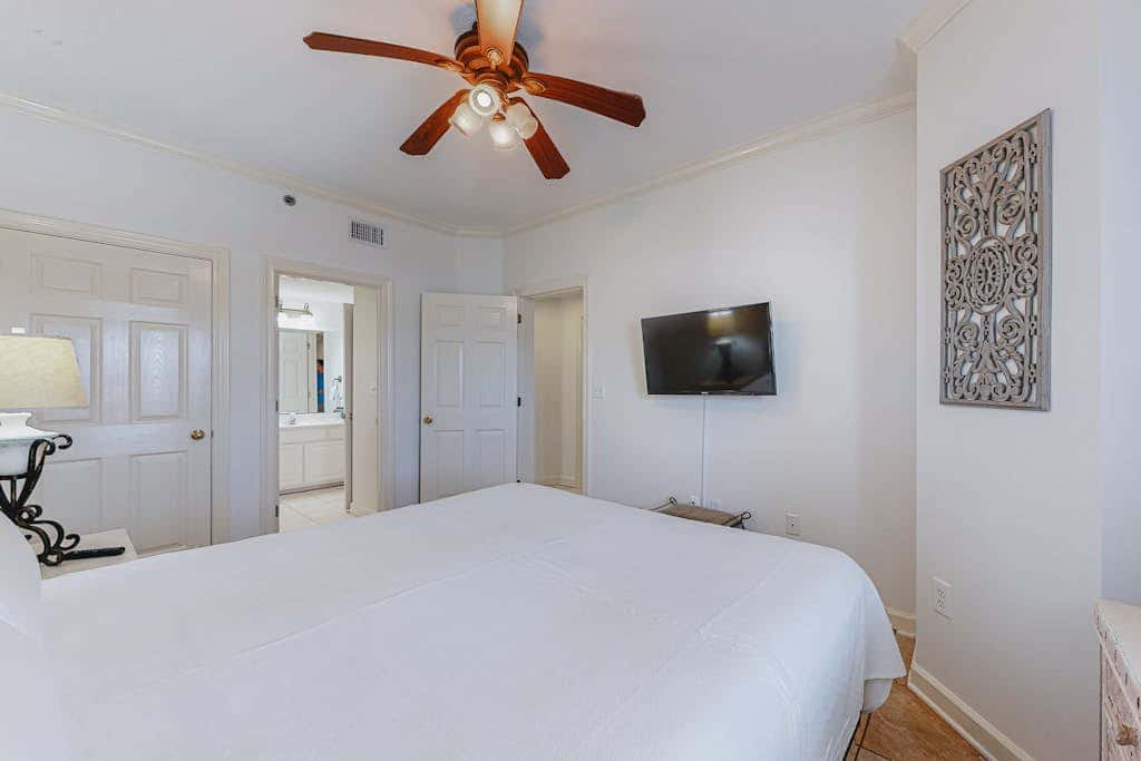 Beachfront resort condo with shared pool, tennis court, free WiFi, central AC