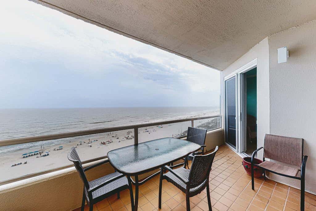 Beachfront resort condo with shared pool, tennis court, free WiFi, central AC