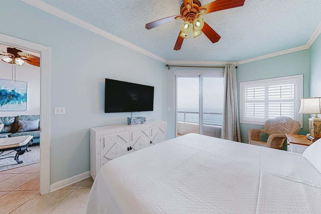 Beachfront resort condo with shared pool, tennis court, free WiFi, central AC