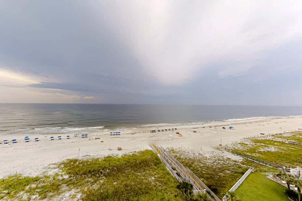 Beachfront resort condo with shared pool, tennis court, free WiFi, central AC