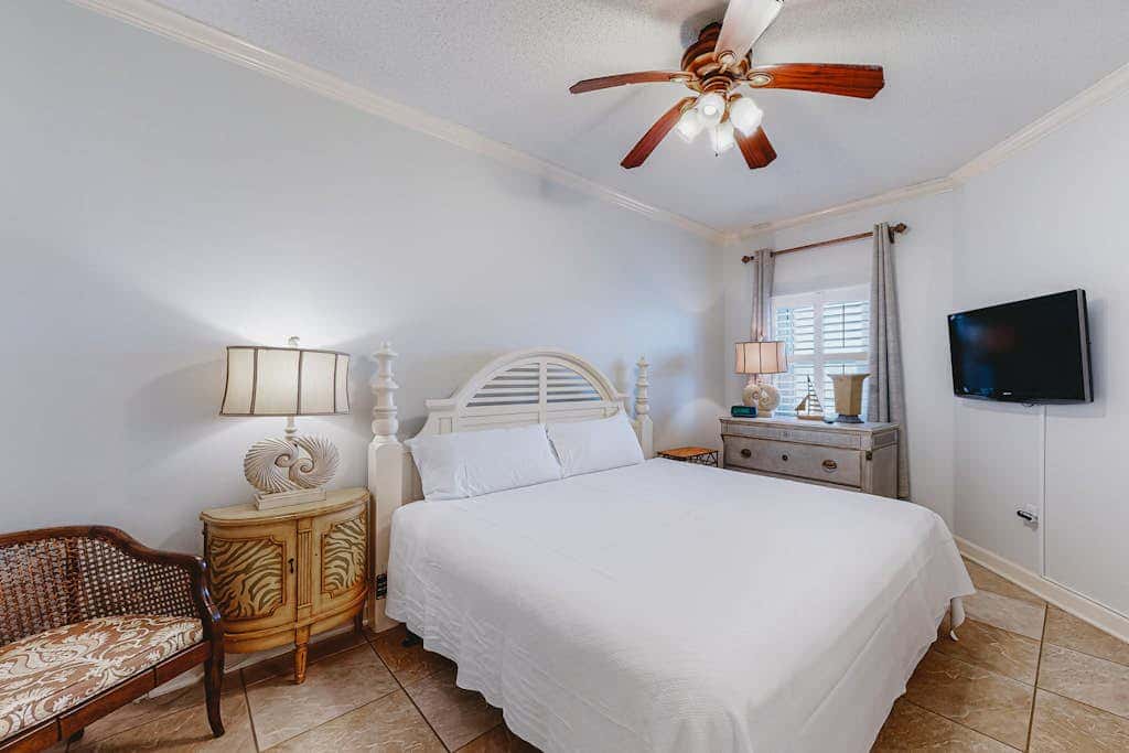 Beachfront resort condo with shared pool, tennis court, free WiFi, central AC