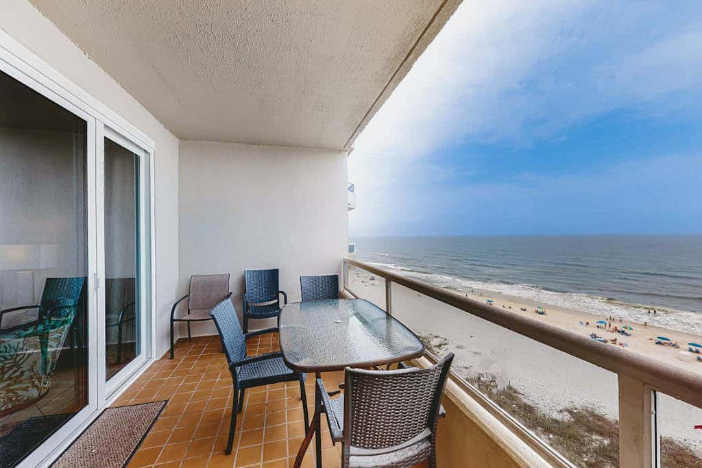 Beachfront resort condo with shared pool, tennis court, free WiFi, central AC