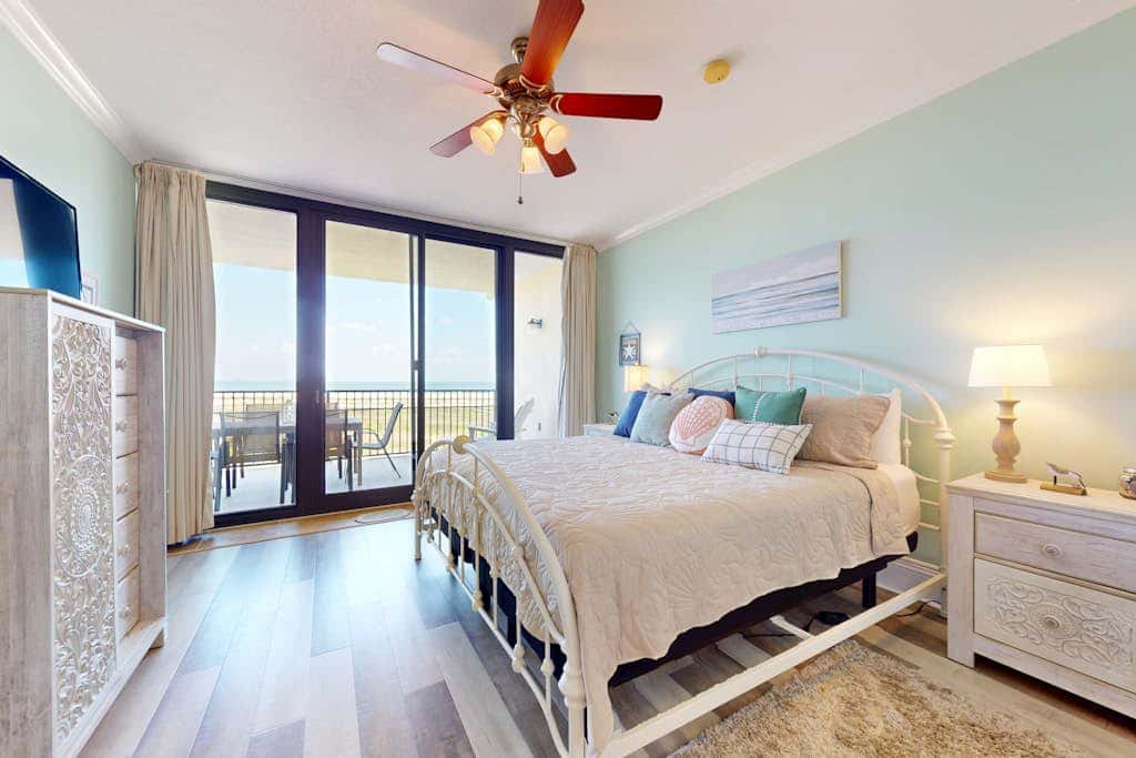 Beachfront condo with pool, private balcony, and laundry