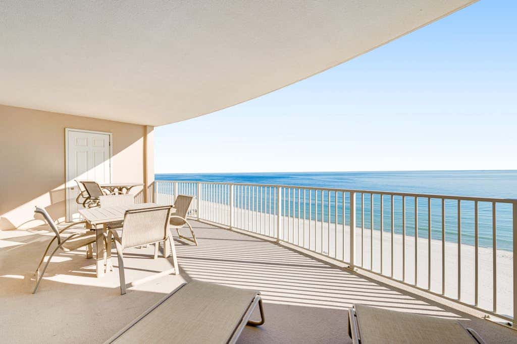 Gulf-front condo with balcony, central AC, pools, hot tubs & beach access