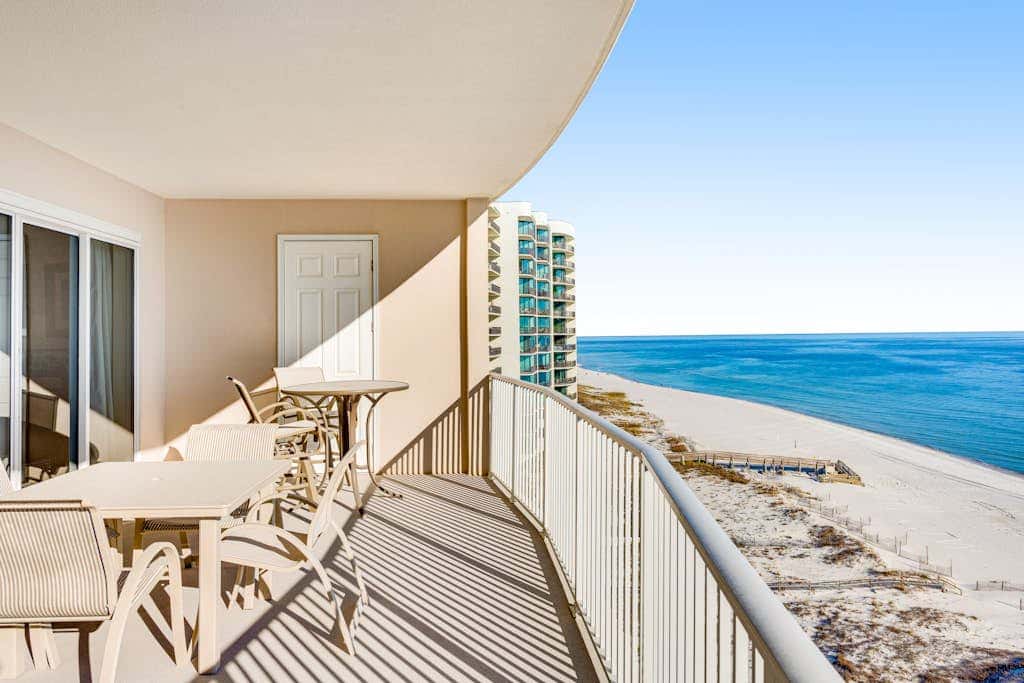 Gulf-front condo with balcony, central AC, pools, hot tubs & beach access